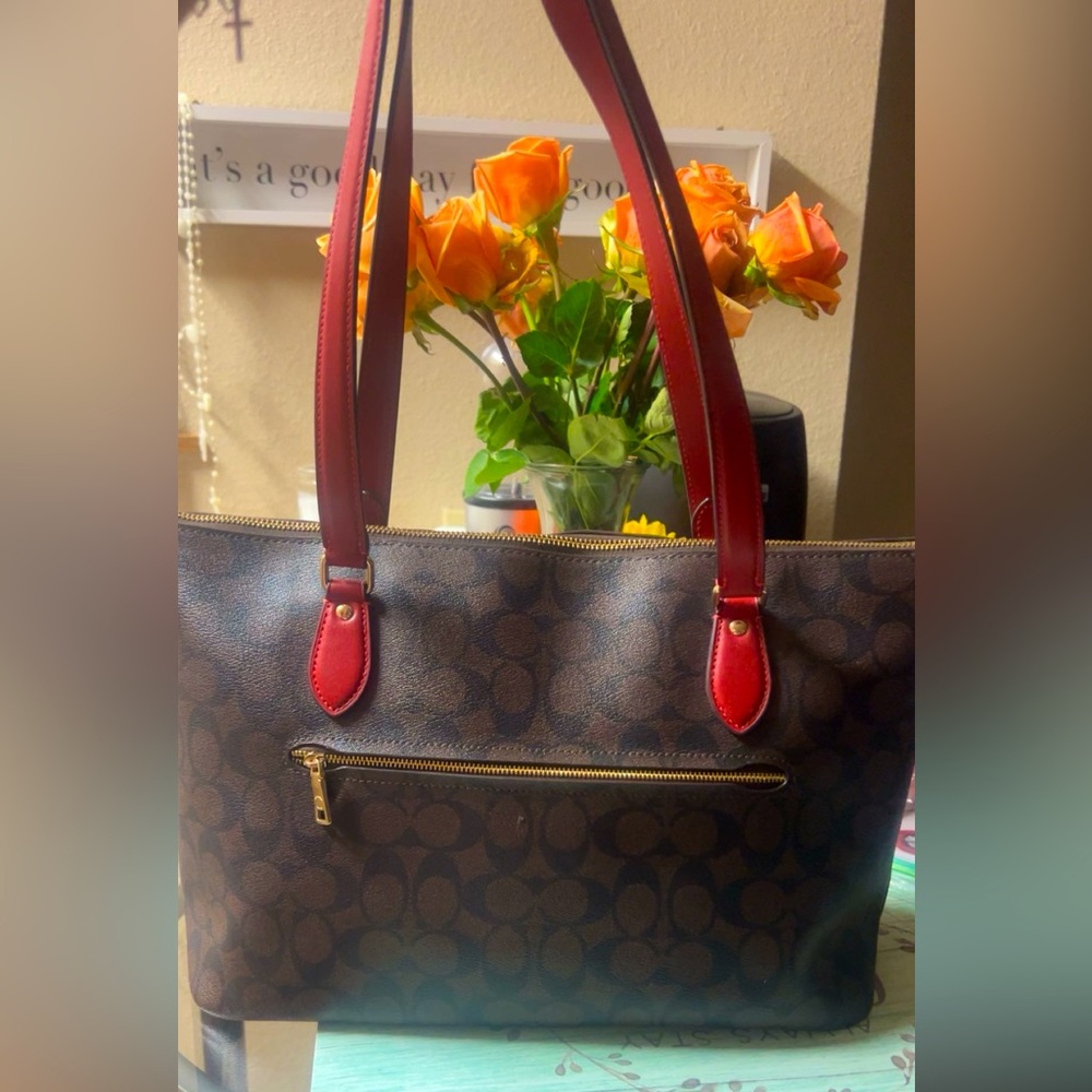 Red and brown Coach bag